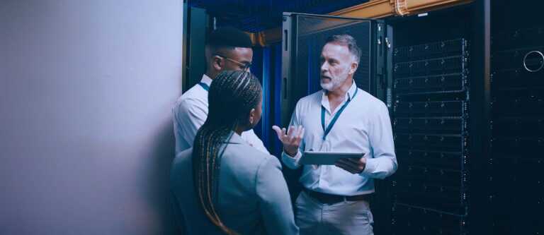 Server Room, Training And Manager With People On Tablet For Cybersecurity, Diagnostics Test And Maintenance. It Team, Meeting And Worker With Boss For Network, Online Database And Technical Support