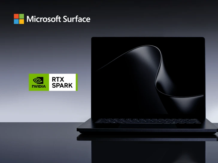 Front view of a sleek black Microsoft Surface laptop open on a reflective studio surface, displaying a dark fluid wallpaper with NVIDIA RTX Spark branding.