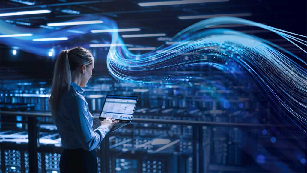 Data Center Female It Specialist Uses Laptop Computer. Cloud Com