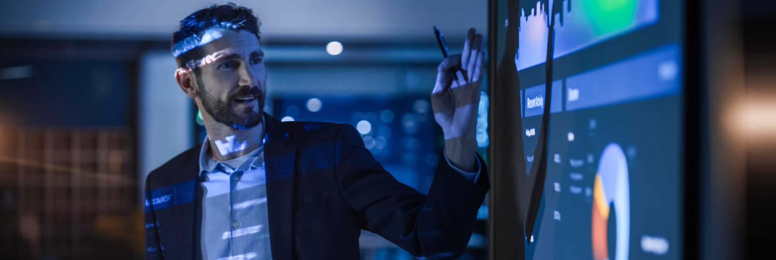 Computer, Research And Business Man Or Programmer For Software Development, Programming Or Cybersecurity. Reading, Glasses And Focus Of It Person With Data Analysis, System Upgrade And Coding Online