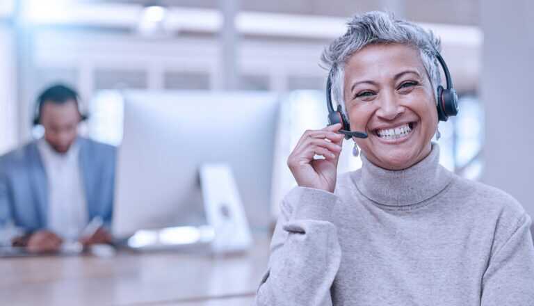 Call Center, Mature And Face Of Woman With Microphone In Office For Telemarketing, Support Or Contact. Smile, Portrait And Customer Service Professional, Sales Manager Or Happy Consultant Listening
